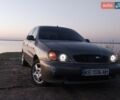 Зеленый Дэу Ланос, объемом двигателя 1.5 л и пробегом 306 тыс. км за 1999 $, фото 1 на Automoto.ua