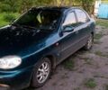 Дэу Ланос 2003 в Вознесенске на Automoto.ua Зеленый Дэу Ланос, объемом двигателя 1.5 л и пробегом 290 тыс. км за 2400 $, фото 1 на Automoto.ua