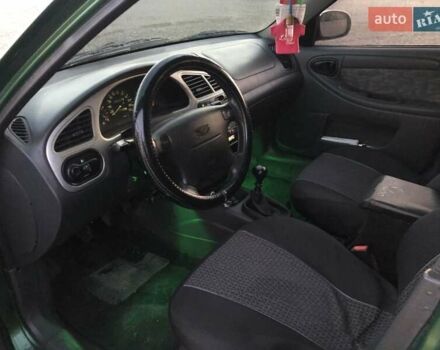 Дэу Ланос 2003 в Виноградове на Automoto.ua Зеленый Дэу Ланос, объемом двигателя 1.6 л и пробегом 255 тыс. км за 3350 $, фото 1 на Automoto.ua