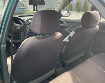 Зеленый Дэу Ланос, объемом двигателя 1.5 л и пробегом 310 тыс. км за 1300 $, фото 19 на Automoto.ua