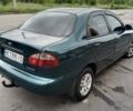 Зеленый Дэу Ланос, объемом двигателя 1.5 л и пробегом 240 тыс. км за 1999 $, фото 3 на Automoto.ua