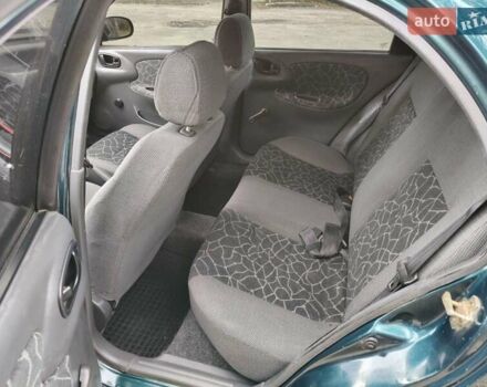Дэу Ланос 2003 в Запорожье на Automoto.ua Зеленый Дэу Ланос, объемом двигателя 1.5 л и пробегом 97 тыс. км за 3300 $, фото 7 на Automoto.ua