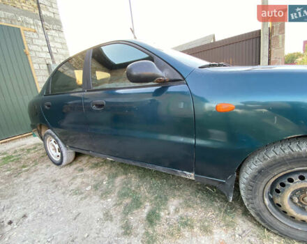 Деу Ланос 2003 у Тернополі на Automoto.ua Зелений Деу Ланос, об'ємом двигуна 1.5 л та пробігом 471 тис. км за 1500 $, фото 9 на Automoto.ua