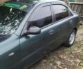 Деу Ланос 2003 у Люботине на Automoto.ua Зелений Деу Ланос, об'ємом двигуна 1.5 л та пробігом 200 тис. км за 2000 $, фото 1 на Automoto.ua