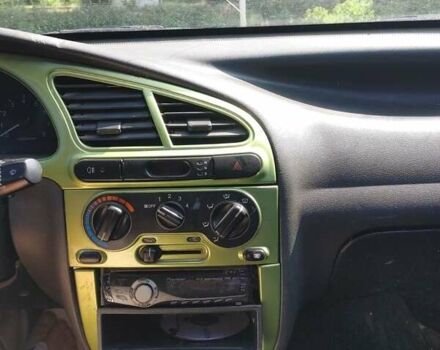 Зеленый Дэу Ланос, объемом двигателя 1.6 л и пробегом 230 тыс. км за 1399 $, фото 12 на Automoto.ua