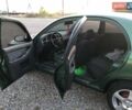 Дэу Ланос 2003 в Виноградове на Automoto.ua Зеленый Дэу Ланос, объемом двигателя 1.6 л и пробегом 255 тыс. км за 3350 $, фото 4 на Automoto.ua