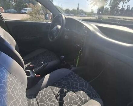 Дэу Ланос 2003 в Коростышеве на Automoto.ua Зеленый Дэу Ланос, объемом двигателя 1.5 л и пробегом 241 тыс. км за 2500 $, фото 9 на Automoto.ua
