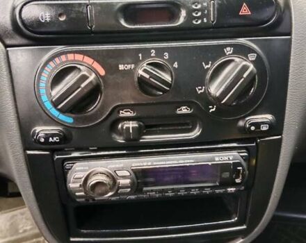 Зеленый Дэу Ланос, объемом двигателя 1.5 л и пробегом 240 тыс. км за 1999 $, фото 12 на Automoto.ua