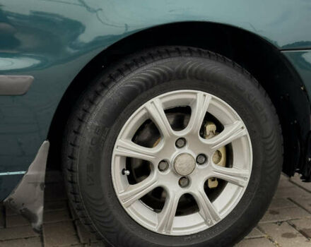 Зеленый Дэу Ланос, объемом двигателя 1.5 л и пробегом 295 тыс. км за 2400 $, фото 4 на Automoto.ua