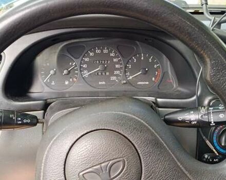 Дэу Ланос 2003 в Вознесенске на Automoto.ua Зеленый Дэу Ланос, объемом двигателя 1.5 л и пробегом 290 тыс. км за 2400 $, фото 5 на Automoto.ua