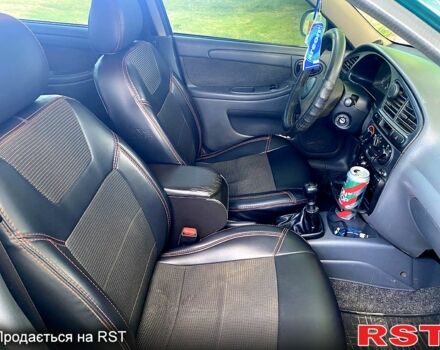 Зеленый Дэу Ланос, объемом двигателя 1.5 л и пробегом 270 тыс. км за 3000 $, фото 4 на Automoto.ua