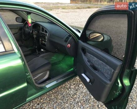 Дэу Ланос 2003 в Виноградове на Automoto.ua Зеленый Дэу Ланос, объемом двигателя 1.6 л и пробегом 255 тыс. км за 3350 $, фото 5 на Automoto.ua