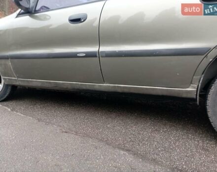 Зеленый Дэу Ланос, объемом двигателя 1.5 л и пробегом 313 тыс. км за 1750 $, фото 8 на Automoto.ua