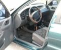 Зеленый Дэу Ланос, объемом двигателя 1.5 л и пробегом 230 тыс. км за 1300 $, фото 8 на Automoto.ua