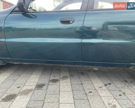 Зеленый Дэу Ланос, объемом двигателя 1.5 л и пробегом 310 тыс. км за 1300 $, фото 11 на Automoto.ua