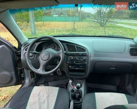 Дэу Ланос 2003 в Репке на Automoto.ua Зеленый Дэу Ланос, объемом двигателя 1.5 л и пробегом 250 тыс. км за 1800 $, фото 11 на Automoto.ua