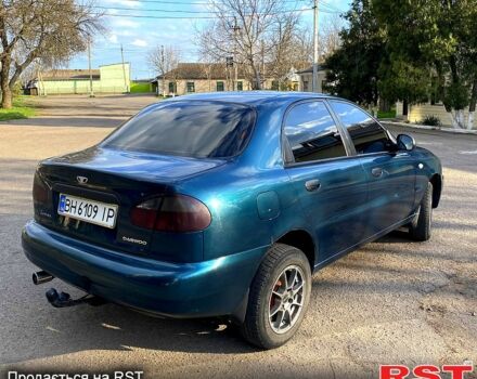 Зеленый Дэу Ланос, объемом двигателя 1.5 л и пробегом 205 тыс. км за 2800 $, фото 2 на Automoto.ua