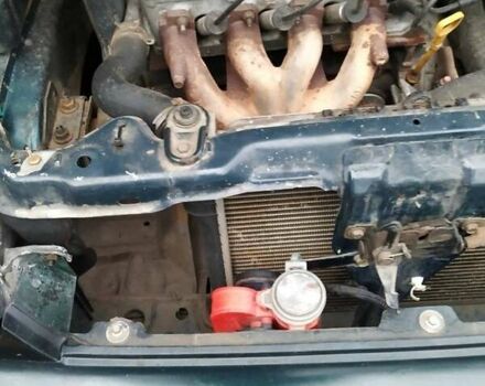 Деу Ланос 2003 у Люботине на Automoto.ua Зелений Деу Ланос, об'ємом двигуна 1.5 л та пробігом 200 тис. км за 2000 $, фото 5 на Automoto.ua