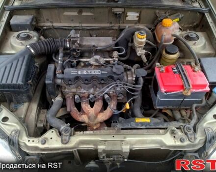 Зеленый Дэу Ланос, объемом двигателя 1.5 л и пробегом 207 тыс. км за 2200 $, фото 12 на Automoto.ua