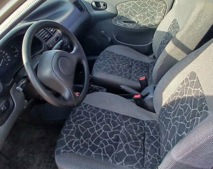 Зеленый Дэу Ланос, объемом двигателя 1.5 л и пробегом 309 тыс. км за 2300 $, фото 5 на Automoto.ua