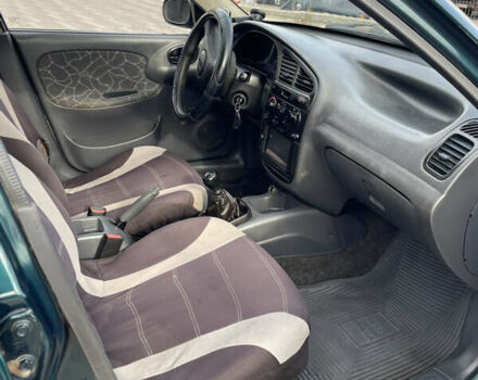 Зеленый Дэу Ланос, объемом двигателя 1.5 л и пробегом 310 тыс. км за 1300 $, фото 22 на Automoto.ua