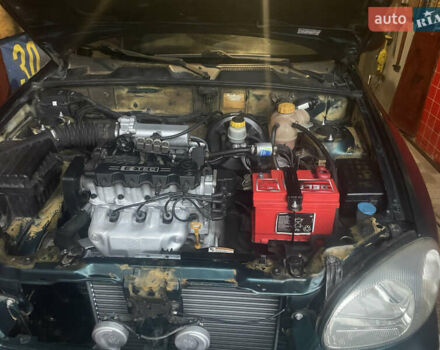 Зеленый Дэу Ланос, объемом двигателя 1.5 л и пробегом 163 тыс. км за 2300 $, фото 1 на Automoto.ua