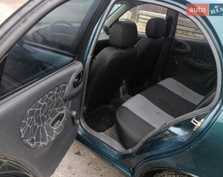 Зеленый Дэу Ланос, объемом двигателя 1.6 л и пробегом 278 тыс. км за 2200 $, фото 5 на Automoto.ua