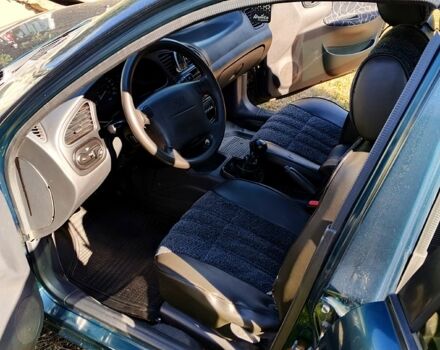 Зеленый Дэу Ланос, объемом двигателя 1.6 л и пробегом 450 тыс. км за 3000 $, фото 11 на Automoto.ua