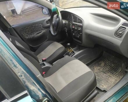 Зеленый Дэу Ланос, объемом двигателя 1.5 л и пробегом 128 тыс. км за 2300 $, фото 2 на Automoto.ua