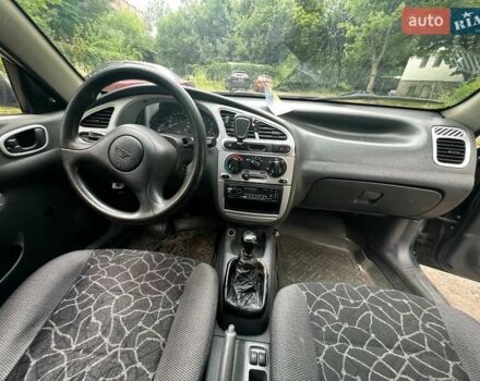 Зеленый Дэу Ланос, объемом двигателя 1.5 л и пробегом 242 тыс. км за 2000 $, фото 7 на Automoto.ua