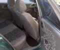 Зеленый Дэу Ланос, объемом двигателя 1.5 л и пробегом 230 тыс. км за 1300 $, фото 2 на Automoto.ua