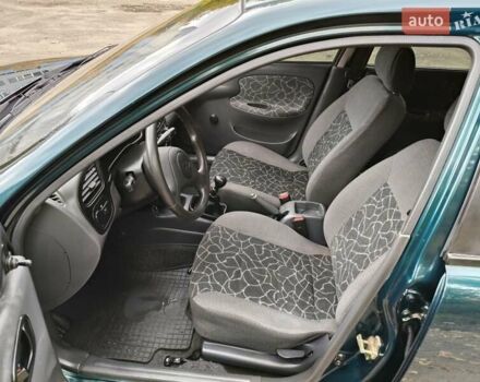 Дэу Ланос 2003 в Запорожье на Automoto.ua Зеленый Дэу Ланос, объемом двигателя 1.5 л и пробегом 97 тыс. км за 3300 $, фото 3 на Automoto.ua