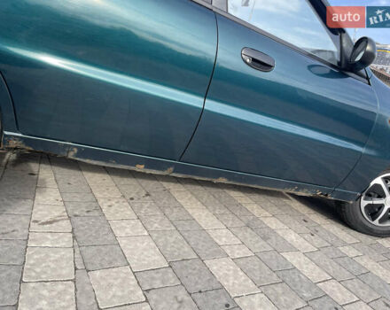 Зеленый Дэу Ланос, объемом двигателя 1.5 л и пробегом 310 тыс. км за 1300 $, фото 10 на Automoto.ua