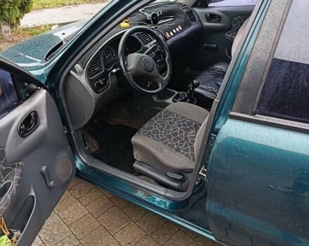 Зеленый Дэу Ланос, объемом двигателя 1.5 л и пробегом 256 тыс. км за 1450 $, фото 6 на Automoto.ua