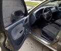 Зеленый Дэу Ланос, объемом двигателя 1.5 л и пробегом 207 тыс. км за 2200 $, фото 13 на Automoto.ua