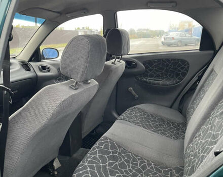 Зеленый Дэу Ланос, объемом двигателя 1.3 л и пробегом 280 тыс. км за 1450 $, фото 6 на Automoto.ua