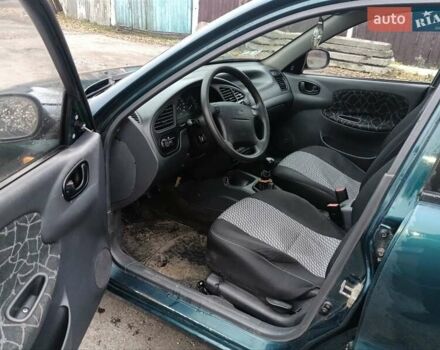 Зеленый Дэу Ланос, объемом двигателя 1.6 л и пробегом 278 тыс. км за 2200 $, фото 4 на Automoto.ua