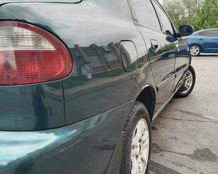 Зеленый Дэу Ланос, объемом двигателя 1.5 л и пробегом 240 тыс. км за 1999 $, фото 5 на Automoto.ua