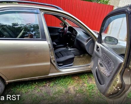 Дэу Ланос 2003 в Славянске на Automoto.ua Зеленый Дэу Ланос, объемом двигателя 1.5 л и пробегом 450 тыс. км за 1100 $, фото 3 на Automoto.ua