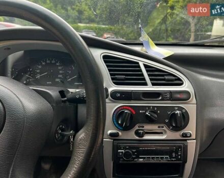 Зеленый Дэу Ланос, объемом двигателя 1.5 л и пробегом 242 тыс. км за 2000 $, фото 9 на Automoto.ua