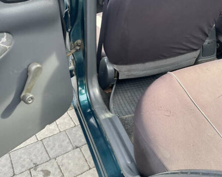 Зеленый Дэу Ланос, объемом двигателя 1.5 л и пробегом 310 тыс. км за 1300 $, фото 16 на Automoto.ua