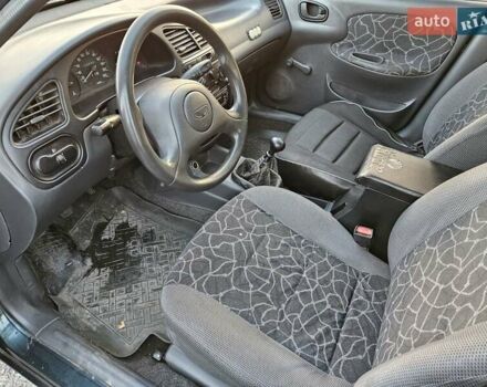 Зеленый Дэу Ланос, объемом двигателя 1.5 л и пробегом 296 тыс. км за 3000 $, фото 9 на Automoto.ua