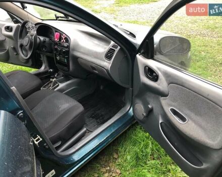 Зеленый Дэу Ланос, объемом двигателя 1.5 л и пробегом 208 тыс. км за 1900 $, фото 8 на Automoto.ua