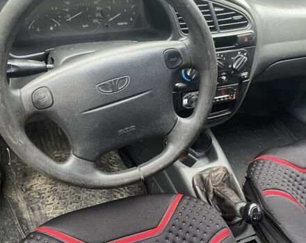 Зеленый Дэу Ланос, объемом двигателя 1.6 л и пробегом 200 тыс. км за 850 $, фото 4 на Automoto.ua