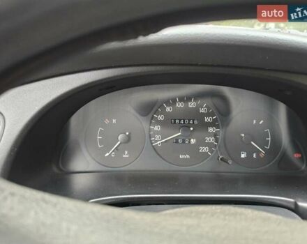 Деу Ланос 2004 у Кривому Розі на Automoto.ua Зелений Деу Ланос, об'ємом двигуна 1.5 л та пробігом 184 тис. км за 3100 $, фото 11 на Automoto.ua