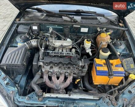 Зеленый Дэу Ланос, объемом двигателя 1.5 л и пробегом 220 тыс. км за 1660 $, фото 9 на Automoto.ua