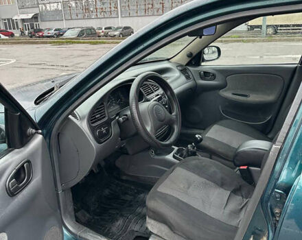 Зелений Деу Ланос, об'ємом двигуна 1.5 л та пробігом 256 тис. км за 1950 $, фото 8 на Automoto.ua