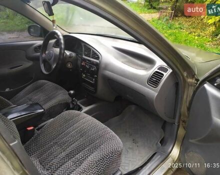 Деу Ланос 2004 у Умани на Automoto.ua Зелений Деу Ланос, об'ємом двигуна 1.5 л та пробігом 300 тис. км за 2300 $, фото 5 на Automoto.ua