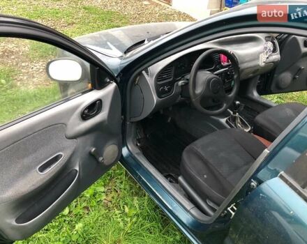 Зеленый Дэу Ланос, объемом двигателя 1.5 л и пробегом 208 тыс. км за 1900 $, фото 7 на Automoto.ua