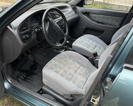 Зеленый Дэу Ланос, объемом двигателя 1.5 л и пробегом 200 тыс. км за 2200 $, фото 10 на Automoto.ua